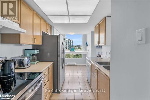 809 - 75 Ellen Street, Barrie (City Centre), ON - Indoor Photo Showing Kitchen With Double Sink