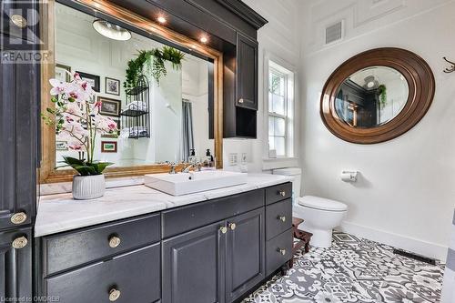 Bathroom with tile patterned flooring, vanity, and toilet - 1486 Kenmuir Avenue, Mississauga, ON - Indoor Photo Showing Bathroom