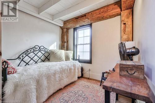 Bedroom featuring beam ceiling and light wood-type flooring - 1486 Kenmuir Avenue, Mississauga, ON - Indoor Photo Showing Bedroom