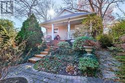 View of front of house featuring a porch - 