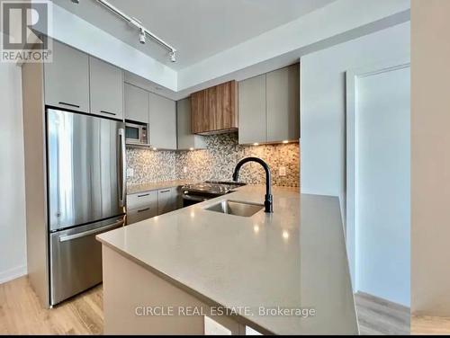 216 - 10 Lagerfeld Drive, Brampton, ON - Indoor Photo Showing Kitchen With Upgraded Kitchen