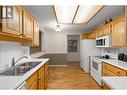 1329 Klo Road Unit# 315, Kelowna, BC  - Indoor Photo Showing Kitchen With Double Sink 