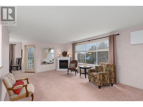 1329 Klo Road Unit# 315, Kelowna, BC - Indoor Photo Showing Living Room With Fireplace