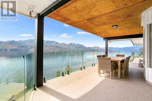 Main floor covered deck - 2888 Seclusion Bay Road, West Kelowna, BC - Outdoor With Body Of Water With View With Exterior