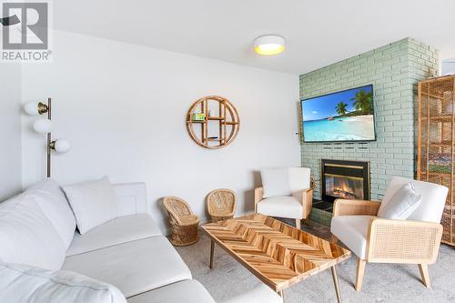 2888 Seclusion Bay Road, West Kelowna, BC - Indoor Photo Showing Living Room With Fireplace