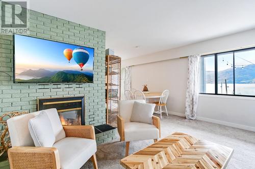 2888 Seclusion Bay Road, West Kelowna, BC - Indoor Photo Showing Living Room With Fireplace