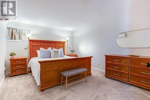 Lower level 3rd bedroom - 2888 Seclusion Bay Road, West Kelowna, BC - Indoor Photo Showing Bedroom