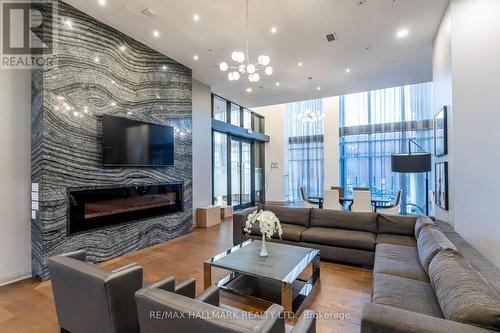 2110 - 400 Adelaide Street E, Toronto, ON - Indoor Photo Showing Living Room With Fireplace