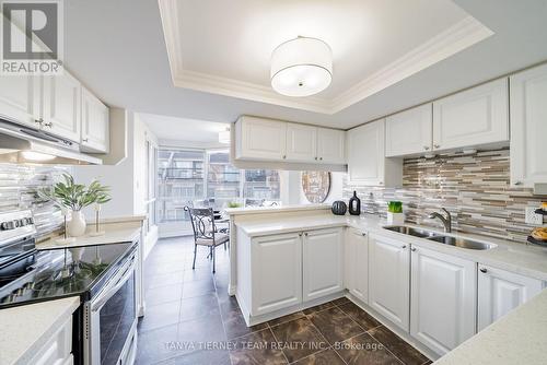 314 - 25 Cumberland Lane, Ajax, ON - Indoor Photo Showing Kitchen With Double Sink