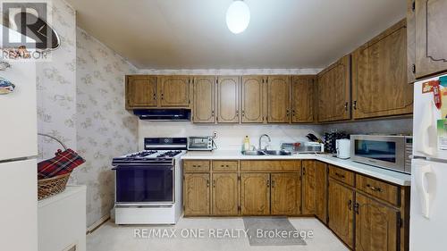 24 Streamdale Court, Toronto, ON - Indoor Photo Showing Kitchen With Double Sink