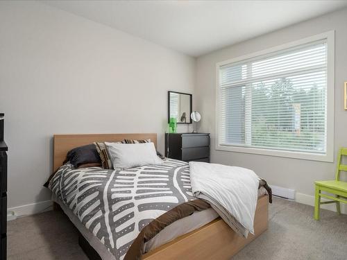 201-6544 Metral Dr, Nanaimo, BC - Indoor Photo Showing Bedroom