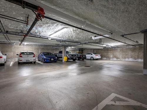 201-6544 Metral Dr, Nanaimo, BC - Indoor Photo Showing Garage