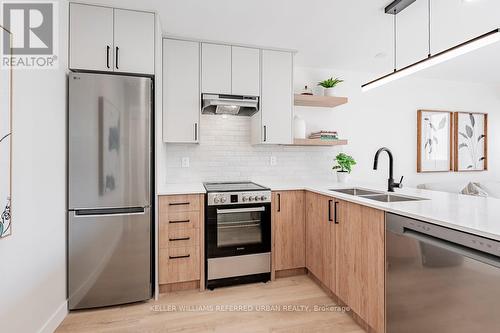 533 - 60 Homewood Avenue, Toronto, ON - Indoor Photo Showing Kitchen With Double Sink With Upgraded Kitchen