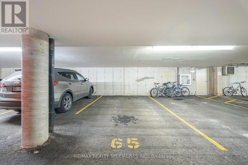 211 - 1480 Bishops Gate, Oakville, ON - Indoor Photo Showing Garage