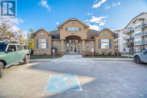 211 - 1480 Bishops Gate, Oakville, ON - Outdoor With Facade