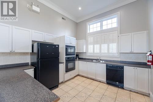 211 - 1480 Bishops Gate, Oakville, ON - Indoor Photo Showing Kitchen With Double Sink