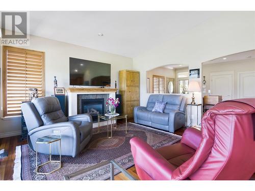 2259 Capistrano Drive, Kelowna, BC - Indoor Photo Showing Living Room With Fireplace