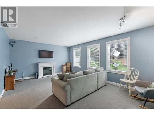 284 Drysdale Boulevard, Kelowna, BC - Indoor Photo Showing Living Room With Fireplace