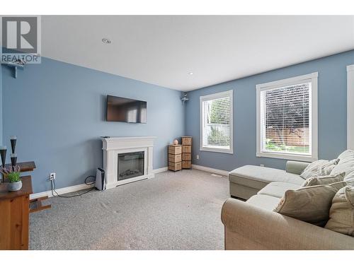 284 Drysdale Boulevard, Kelowna, BC - Indoor Photo Showing Living Room With Fireplace