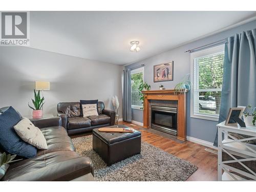 284 Drysdale Boulevard, Kelowna, BC - Indoor Photo Showing Living Room With Fireplace