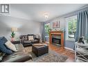 284 Drysdale Boulevard, Kelowna, BC  - Indoor Photo Showing Living Room With Fireplace 