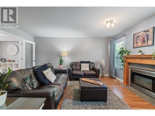 284 Drysdale Boulevard, Kelowna, BC - Indoor Photo Showing Living Room With Fireplace