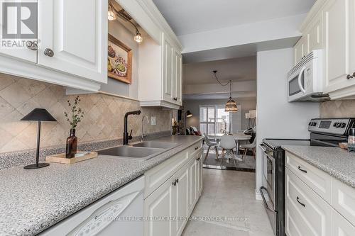 14 Montclair Crescent, Norfolk, ON - Indoor Photo Showing Kitchen With Double Sink