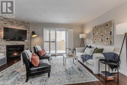 14 Montclair Crescent, Norfolk, ON - Indoor Photo Showing Living Room With Fireplace