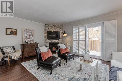 14 Montclair Crescent, Norfolk, ON - Indoor Photo Showing Living Room With Fireplace