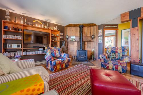 830 Three Mile Road, Penticton, BC - Indoor Photo Showing Living Room With Fireplace