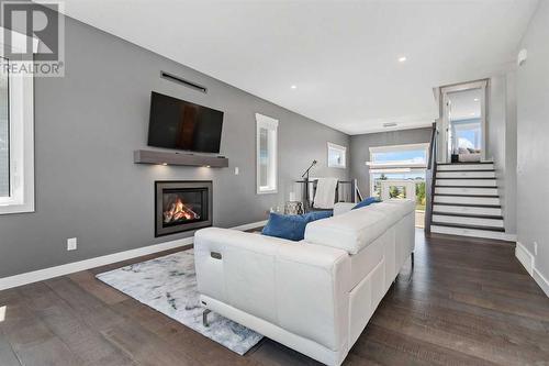 1 Toal Close, Red Deer, AB - Indoor Photo Showing Living Room With Fireplace