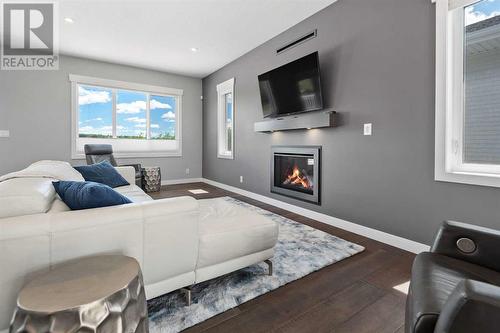 1 Toal Close, Red Deer, AB - Indoor Photo Showing Living Room With Fireplace