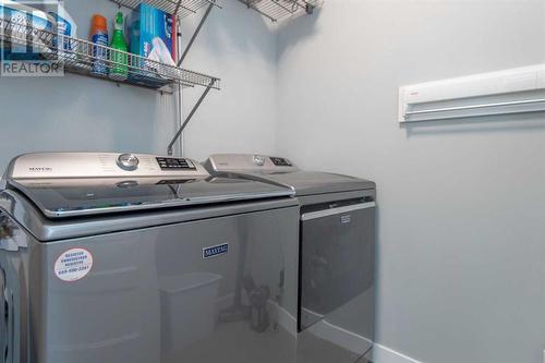 1 Toal Close, Red Deer, AB - Indoor Photo Showing Laundry Room