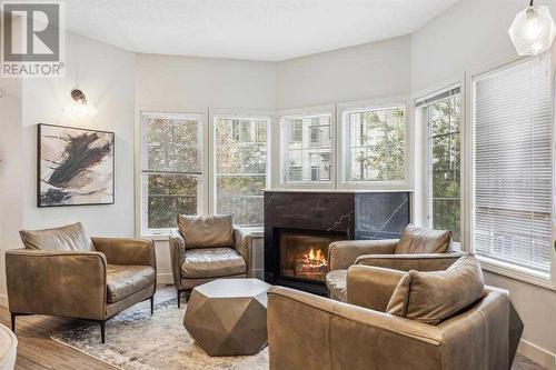 401, 70 Royal Oak Plaza Nw, Calgary, AB - Indoor Photo Showing Living Room With Fireplace