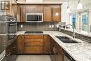 401, 70 Royal Oak Plaza Nw, Calgary, AB  - Indoor Photo Showing Kitchen With Double Sink With Upgraded Kitchen 