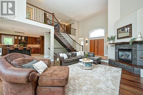 6769 Deer Run Place N, Ottawa, ON - Indoor Photo Showing Living Room With Fireplace