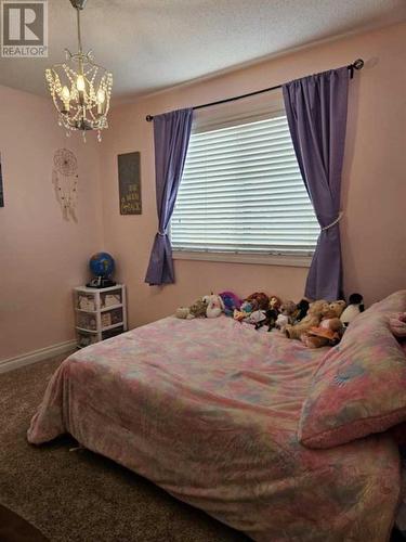 131 Wolverine Drive, Fort Mcmurray, AB - Indoor Photo Showing Bedroom