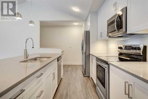 5301, 100 Walgrove Court Se, Calgary, AB - Indoor Photo Showing Kitchen With Stainless Steel Kitchen With Double Sink With Upgraded Kitchen