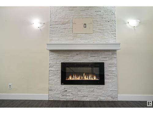 1207 54 St Nw, Edmonton, AB - Indoor Photo Showing Living Room With Fireplace