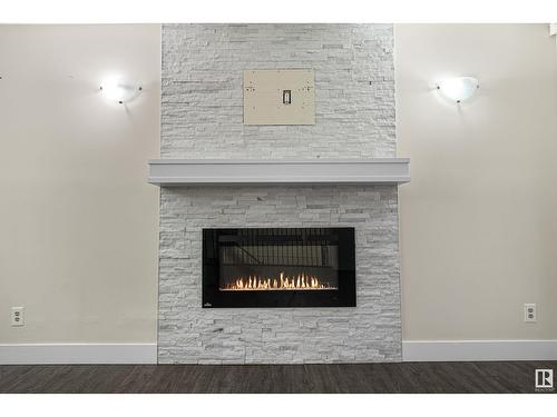 1207 54 St Nw, Edmonton, AB - Indoor Photo Showing Living Room With Fireplace