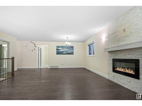 1207 54 St Nw, Edmonton, AB - Indoor Photo Showing Living Room With Fireplace