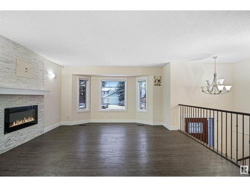 1207 54 St Nw, Edmonton, AB - Indoor Photo Showing Living Room With Fireplace