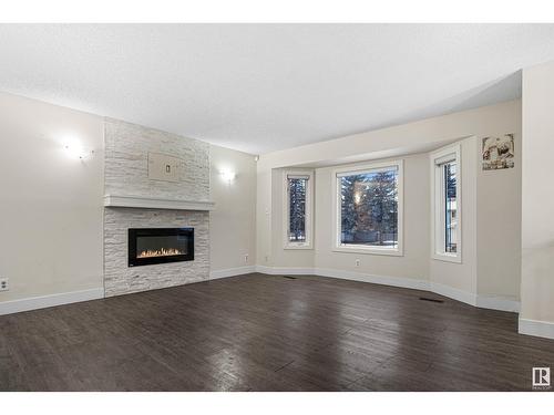 1207 54 St Nw, Edmonton, AB - Indoor Photo Showing Living Room With Fireplace