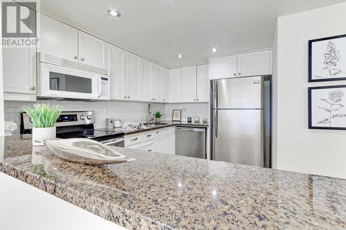 913 - 705 King Street W, Toronto, ON - Indoor Photo Showing Kitchen With Stainless Steel Kitchen With Double Sink With Upgraded Kitchen