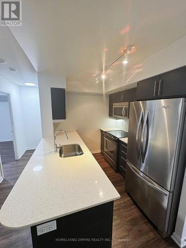 642 - 38 Grand Magazine Street, Toronto, ON - Indoor Photo Showing Kitchen With Stainless Steel Kitchen