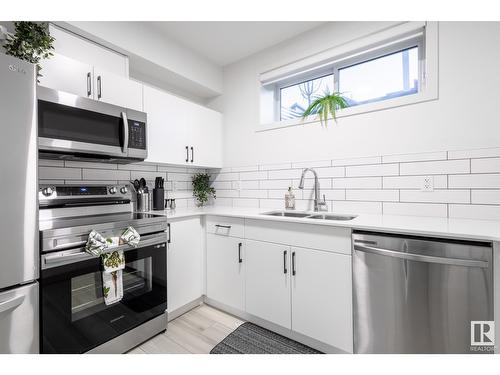 5016 Kinney Li Sw, Edmonton, AB - Indoor Photo Showing Kitchen With Stainless Steel Kitchen With Double Sink