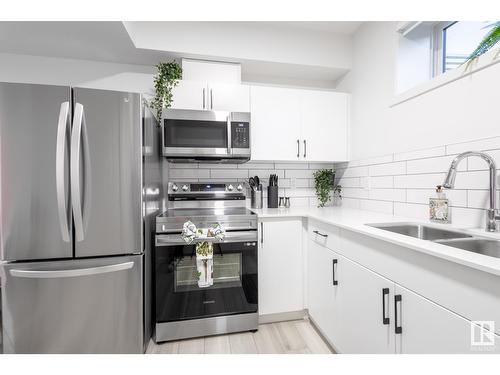 5016 Kinney Li Sw, Edmonton, AB - Indoor Photo Showing Kitchen With Stainless Steel Kitchen With Double Sink