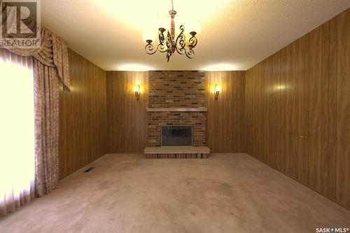 219 Mcintosh Street, Regina, SK - Indoor Photo Showing Other Room With Fireplace