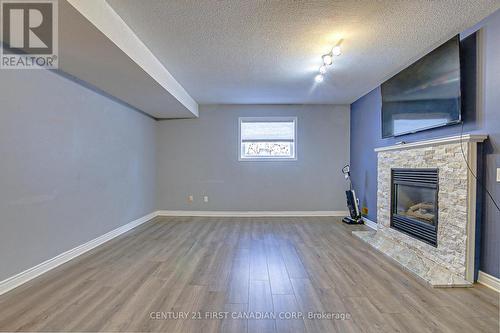 34 Kristina Crescent, London, ON - Indoor Photo Showing Other Room With Fireplace