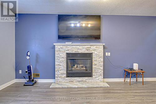 34 Kristina Crescent, London, ON - Indoor Photo Showing Living Room With Fireplace